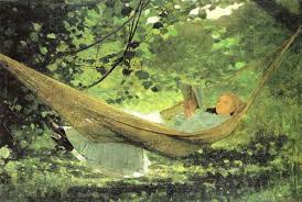 Woman reading summer hammock